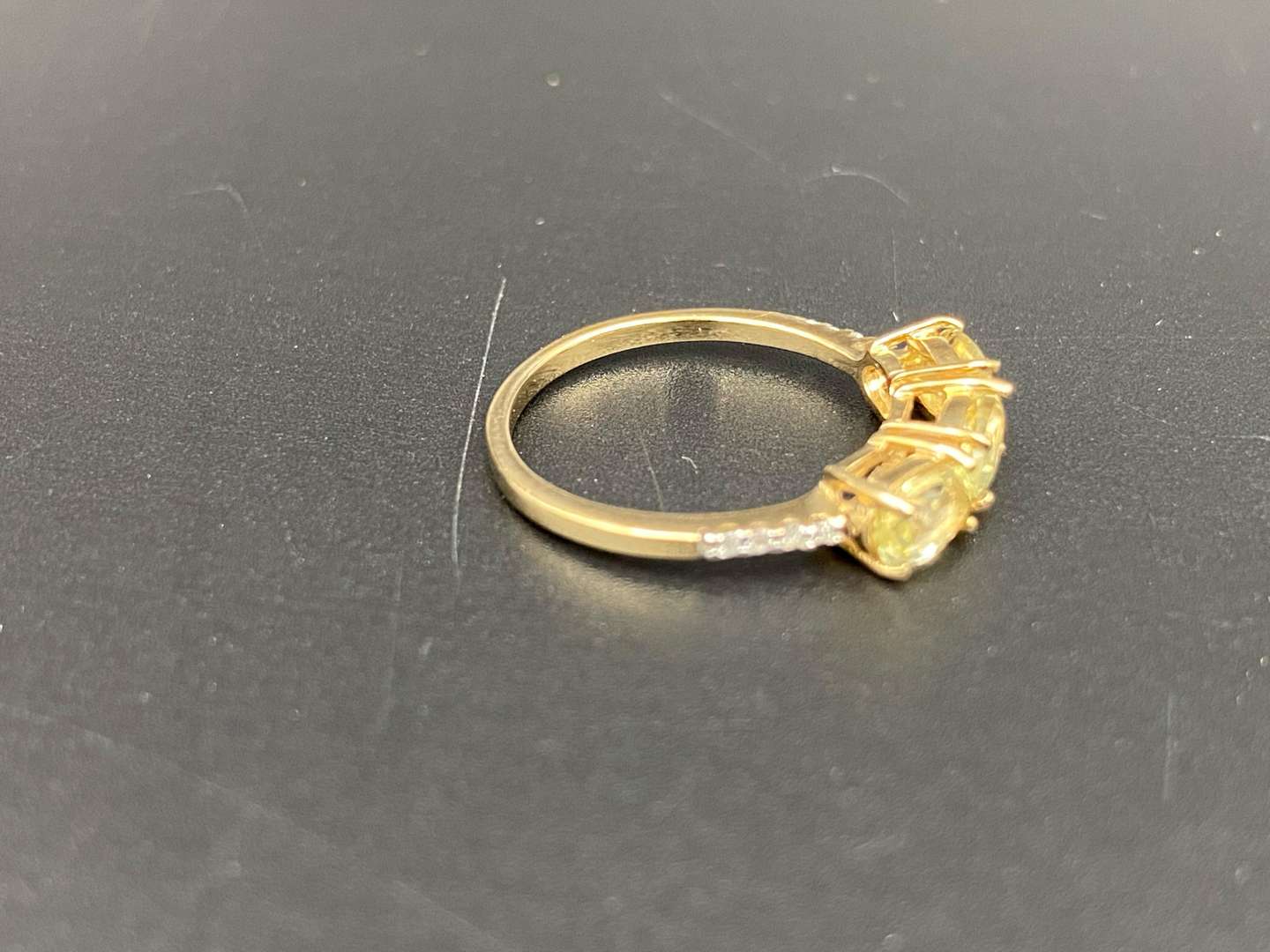 <p>A Lemon Quartz and Diamond set, 9ct gold ring,</p>