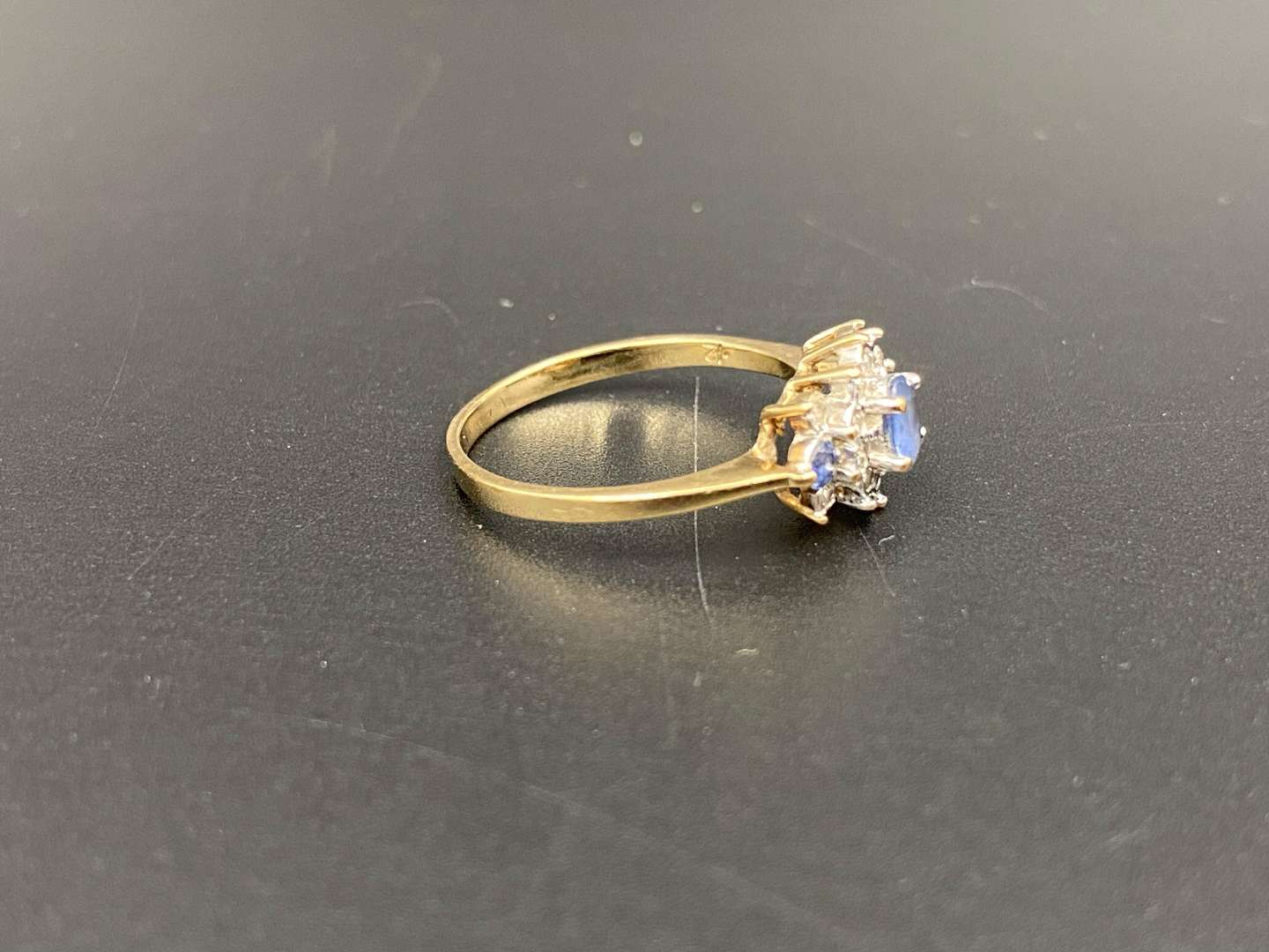 <p>A Saphire and Diamond set, 9ct gold cluster ring,</p>