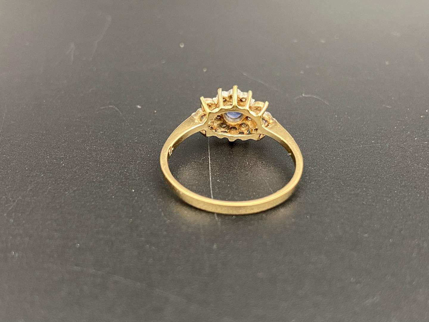 <p>A Saphire and Diamond set, 9ct gold cluster ring,</p>