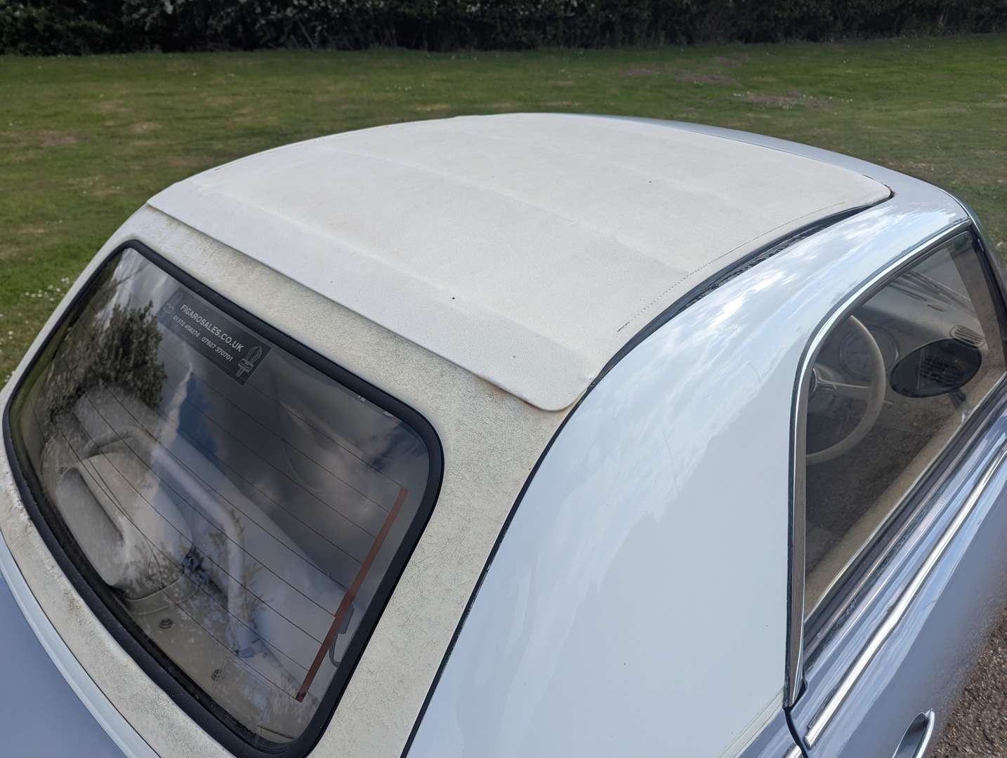 <p>1991 NISSAN FIGARO</p>