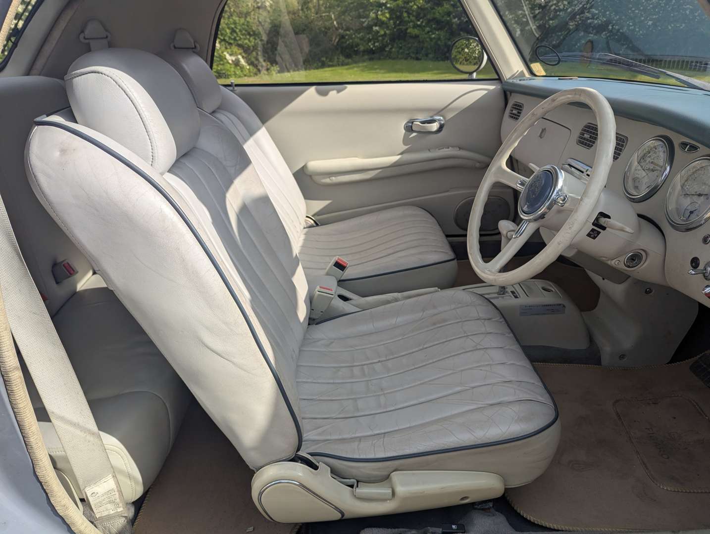 <p>1991 NISSAN FIGARO</p>