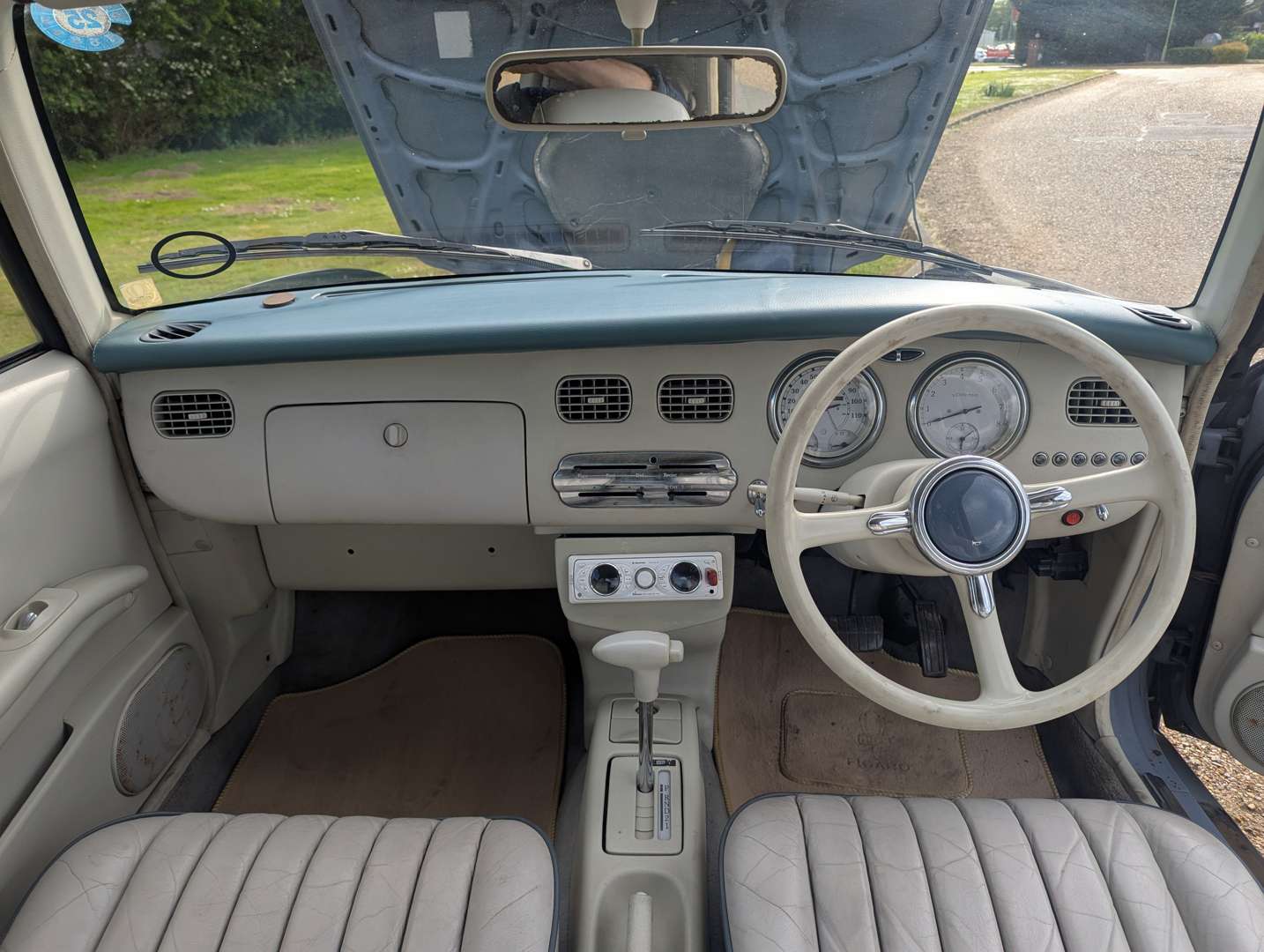 <p>1991 NISSAN FIGARO</p>