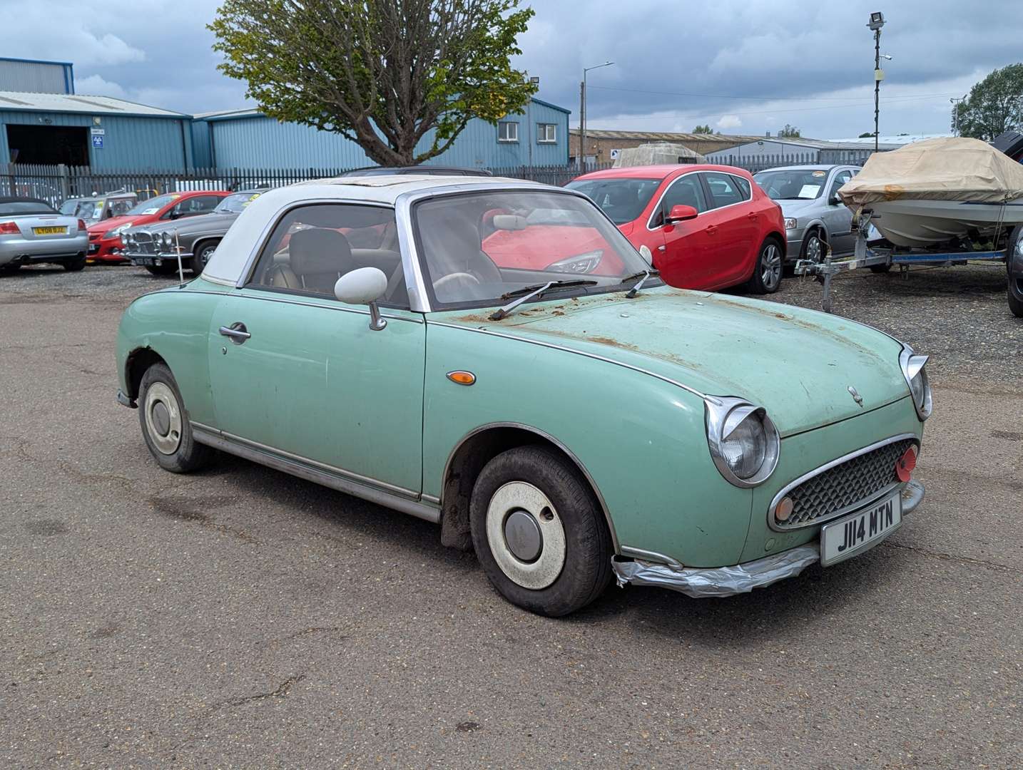 <p>1991 NISSAN FIGARO AUTO</p>