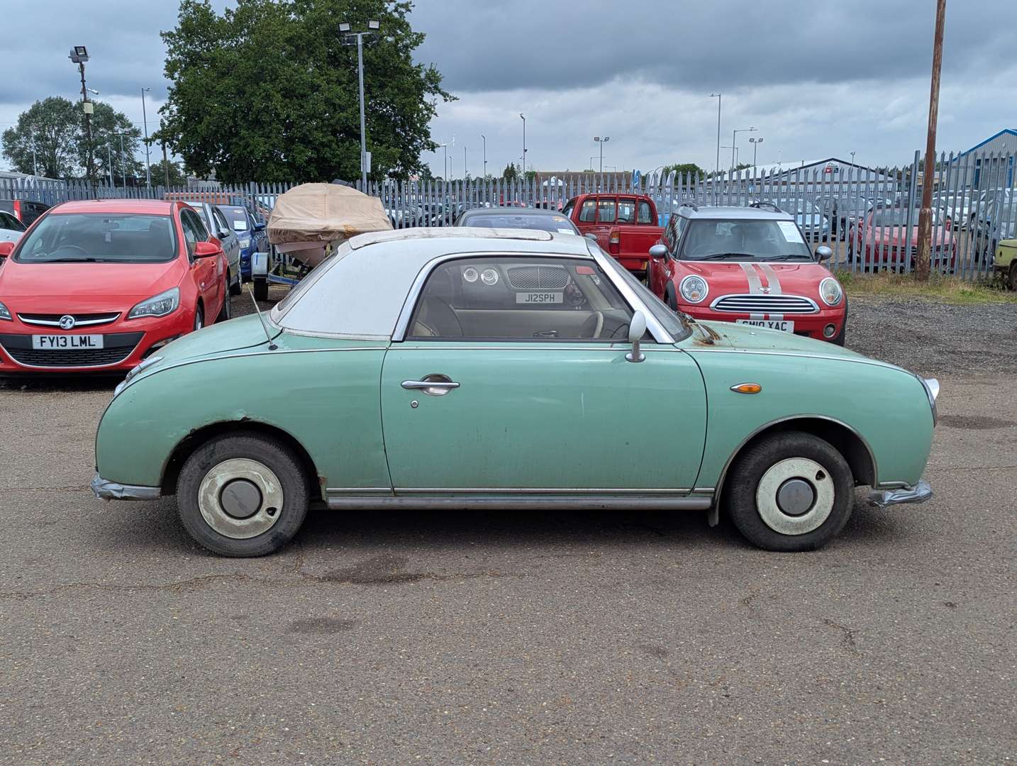 <p>1991 NISSAN FIGARO AUTO</p>