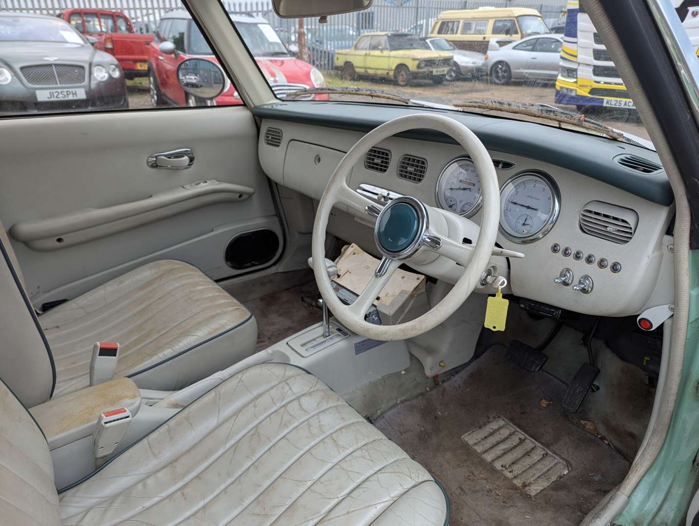 <p>1991 NISSAN FIGARO AUTO</p>