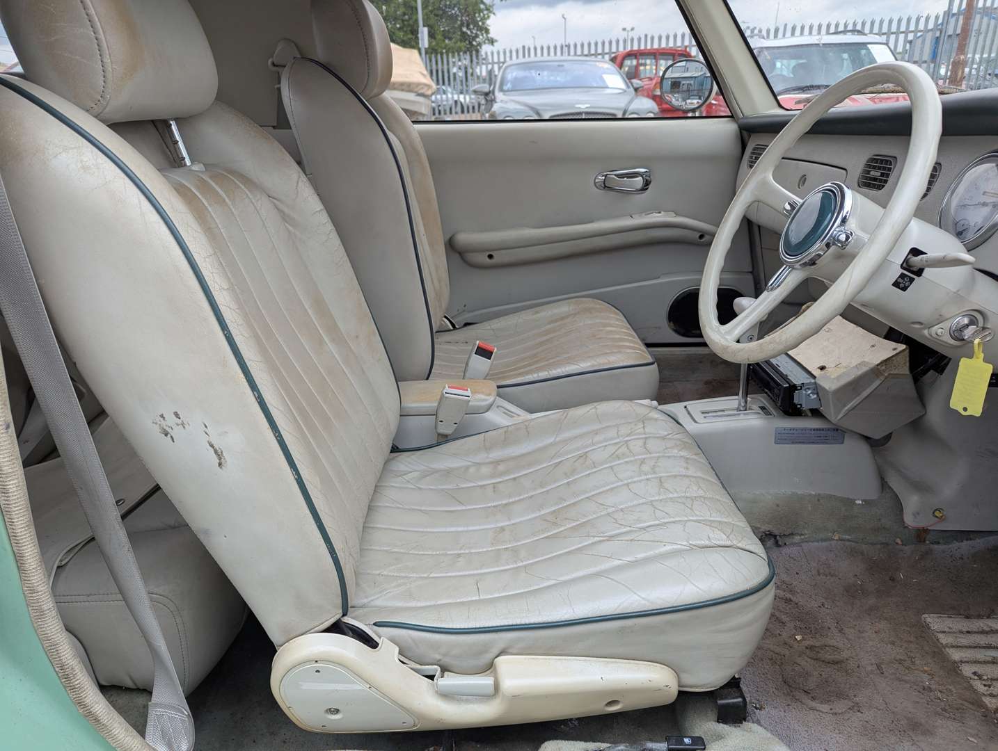 <p>1991 NISSAN FIGARO AUTO</p>