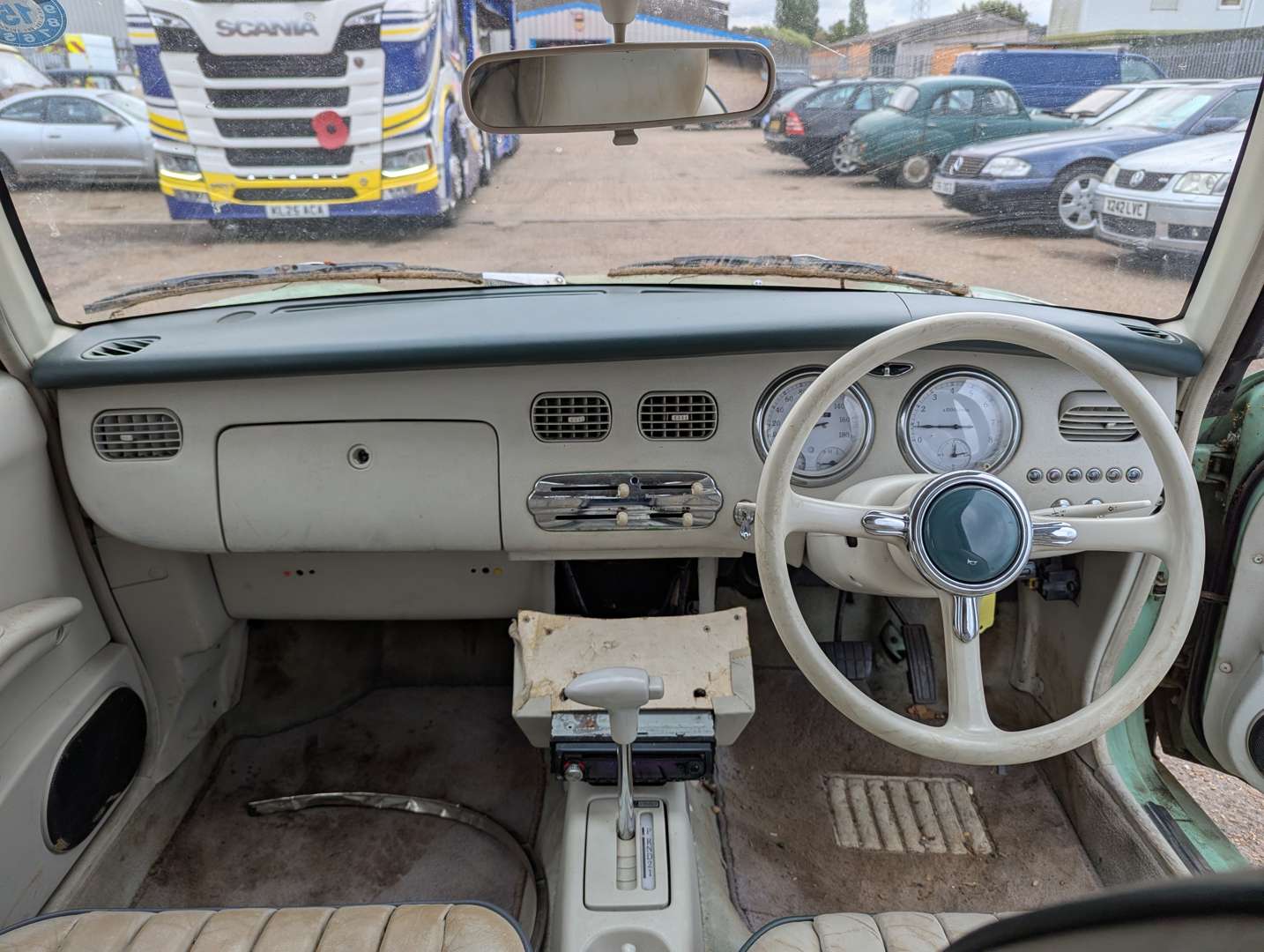 <p>1991 NISSAN FIGARO AUTO</p>