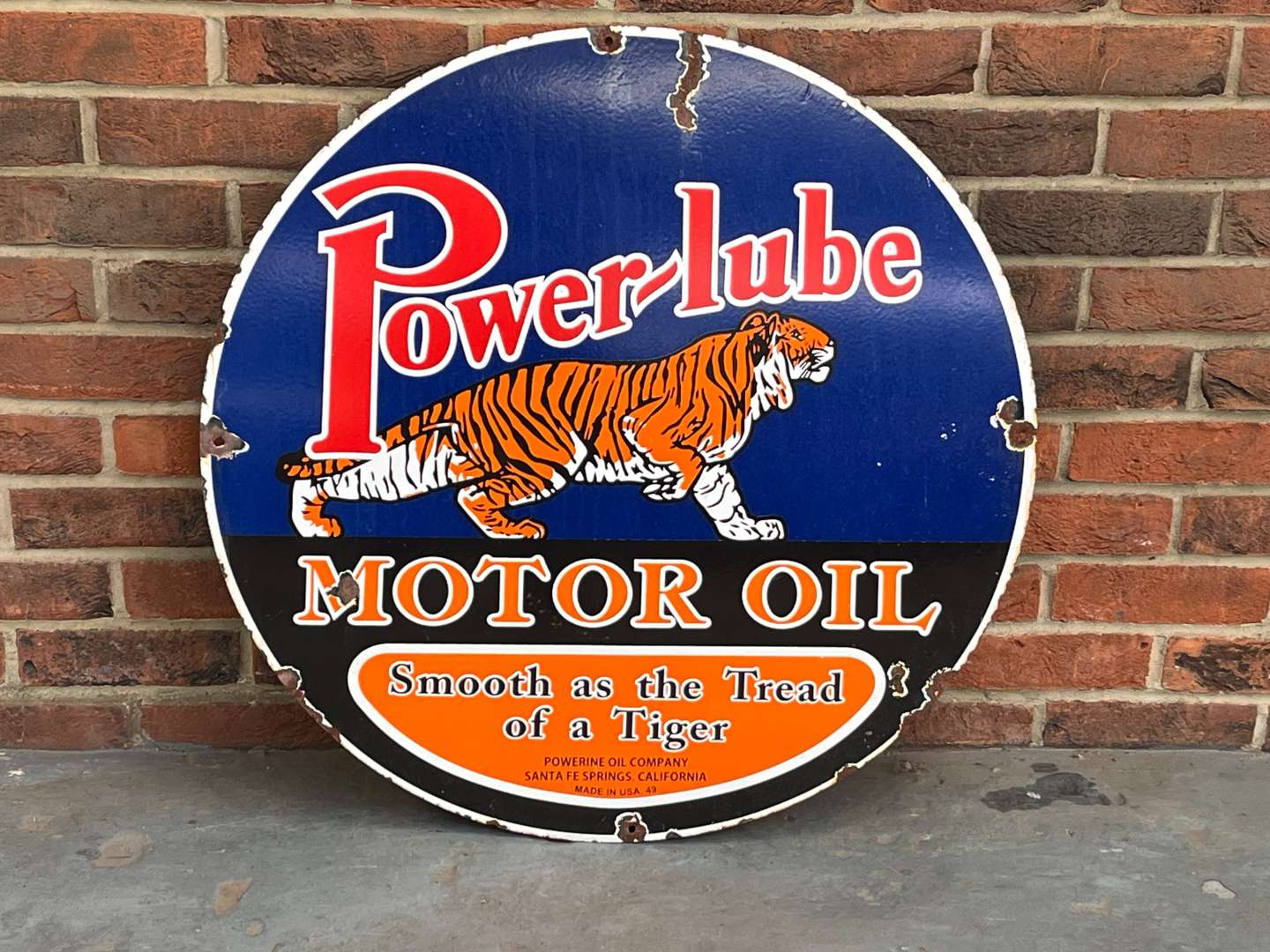 <p>Power-Lube Motor Oil Circular Enamel Sign</p>