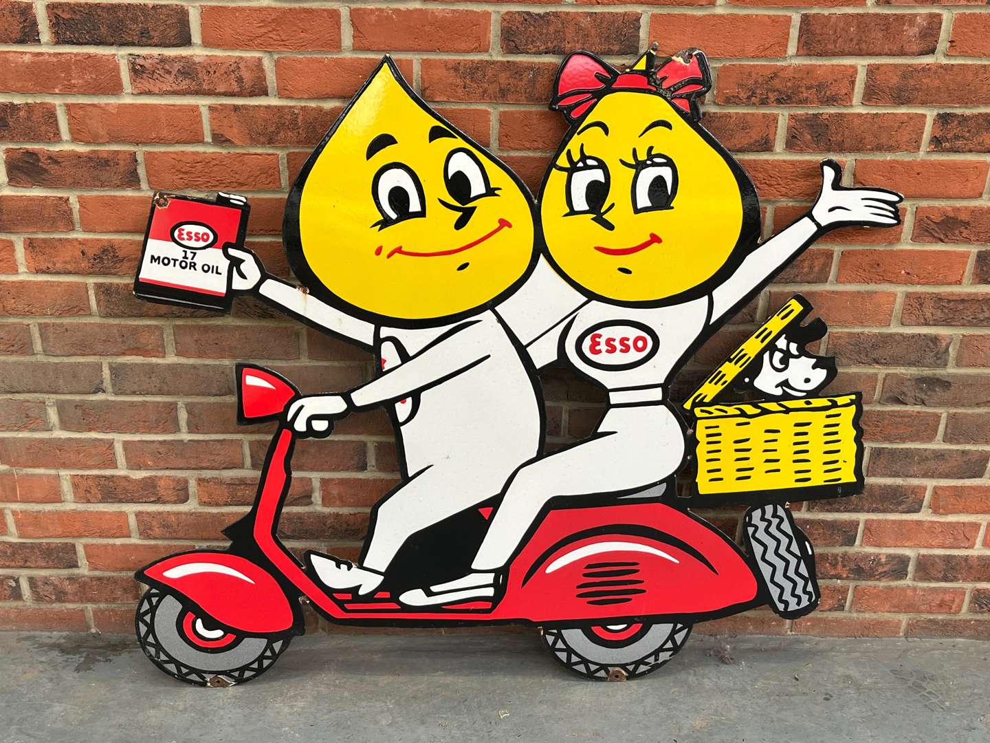 <p>Esso Large Mr and Mrs Drip On a Scooter Enamel Sign</p>