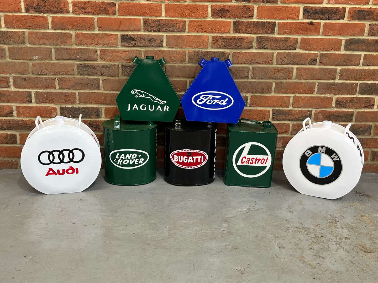 <p>Seven Reproduction Fuel Cans (No Caps)</p>