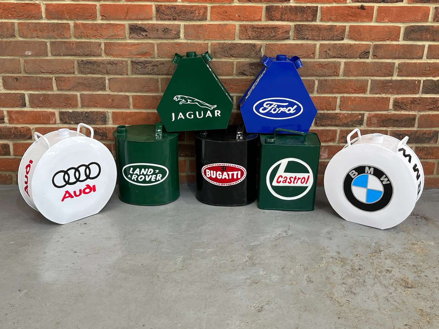 <p>Seven Reproduction Fuel Cans (No Caps)</p>