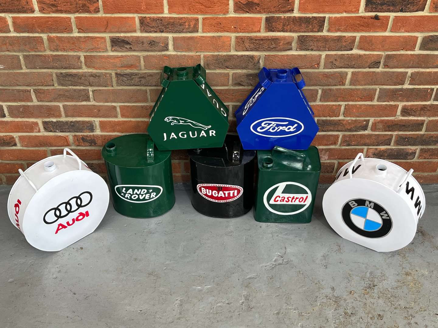 <p>Seven Reproduction Fuel Cans (No Caps)</p>