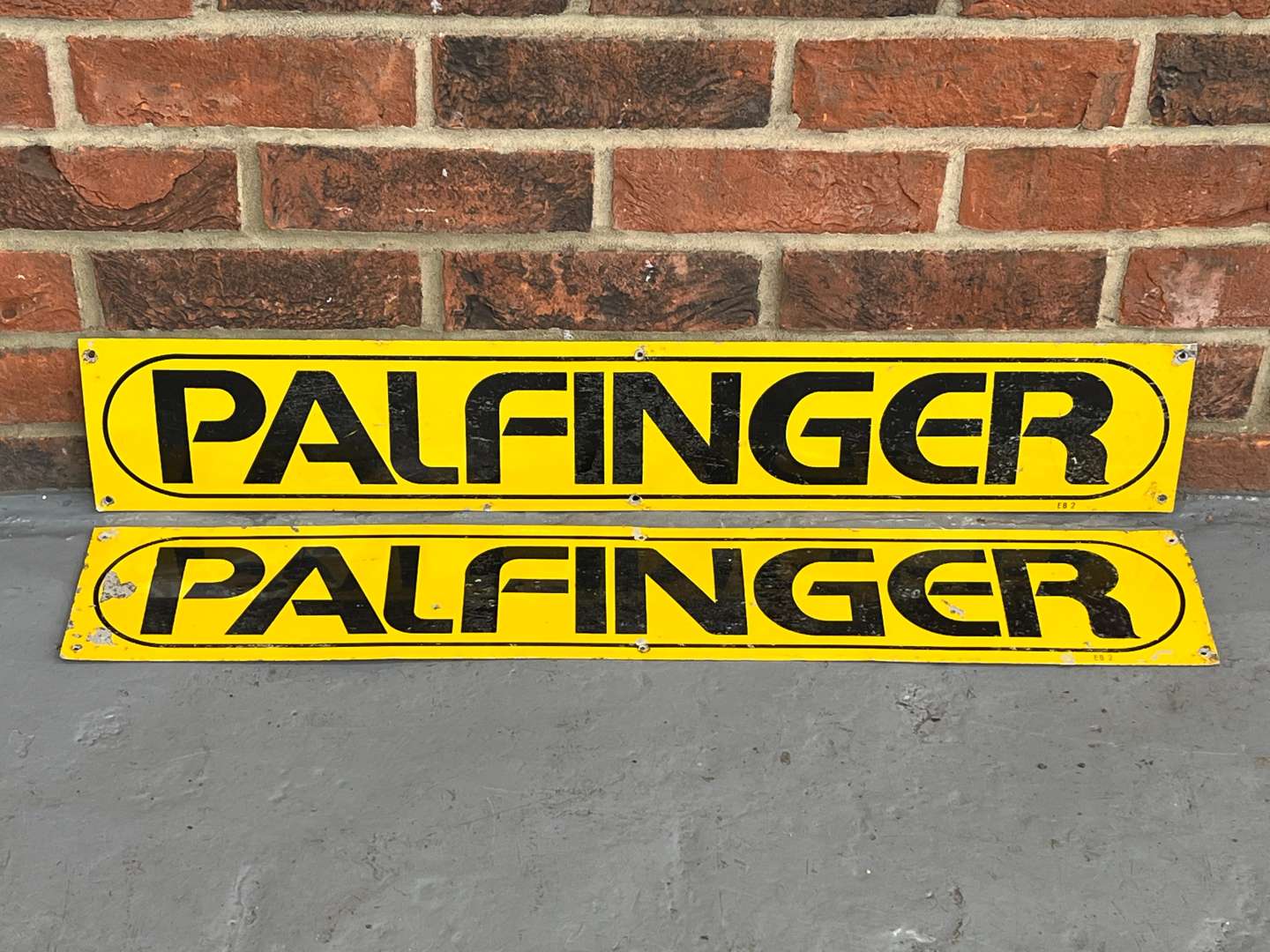 <p>Two Palfinger Metal Signs</p>