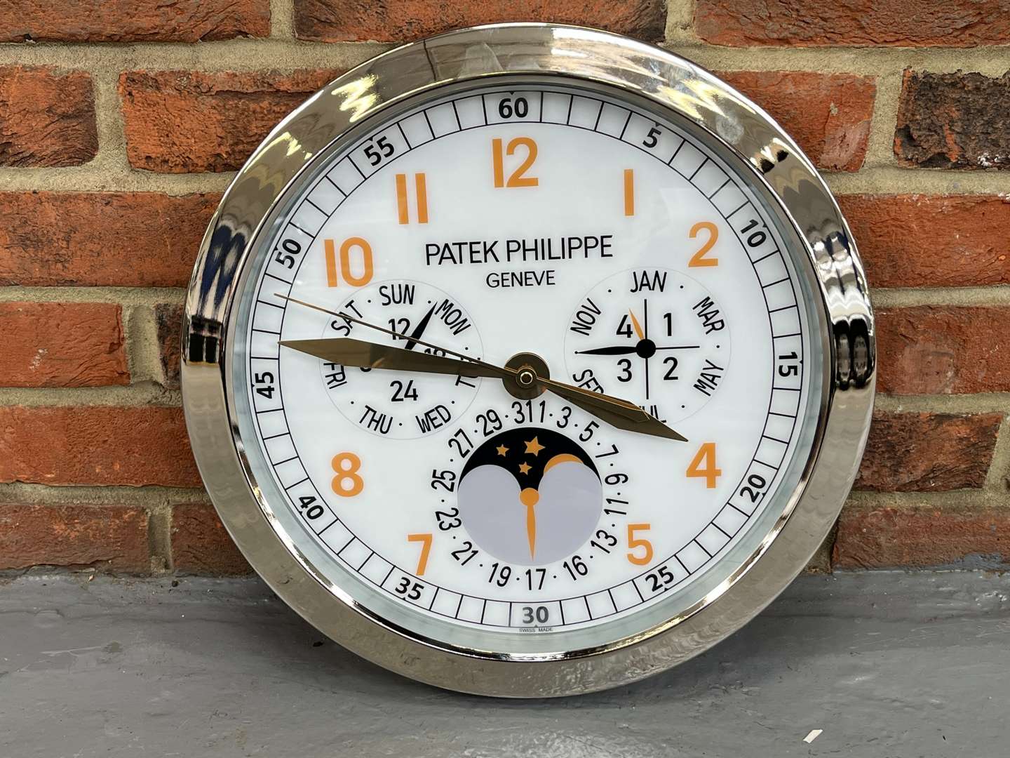 <p>Patek Philippe Modern Metal Wall Clock</p>