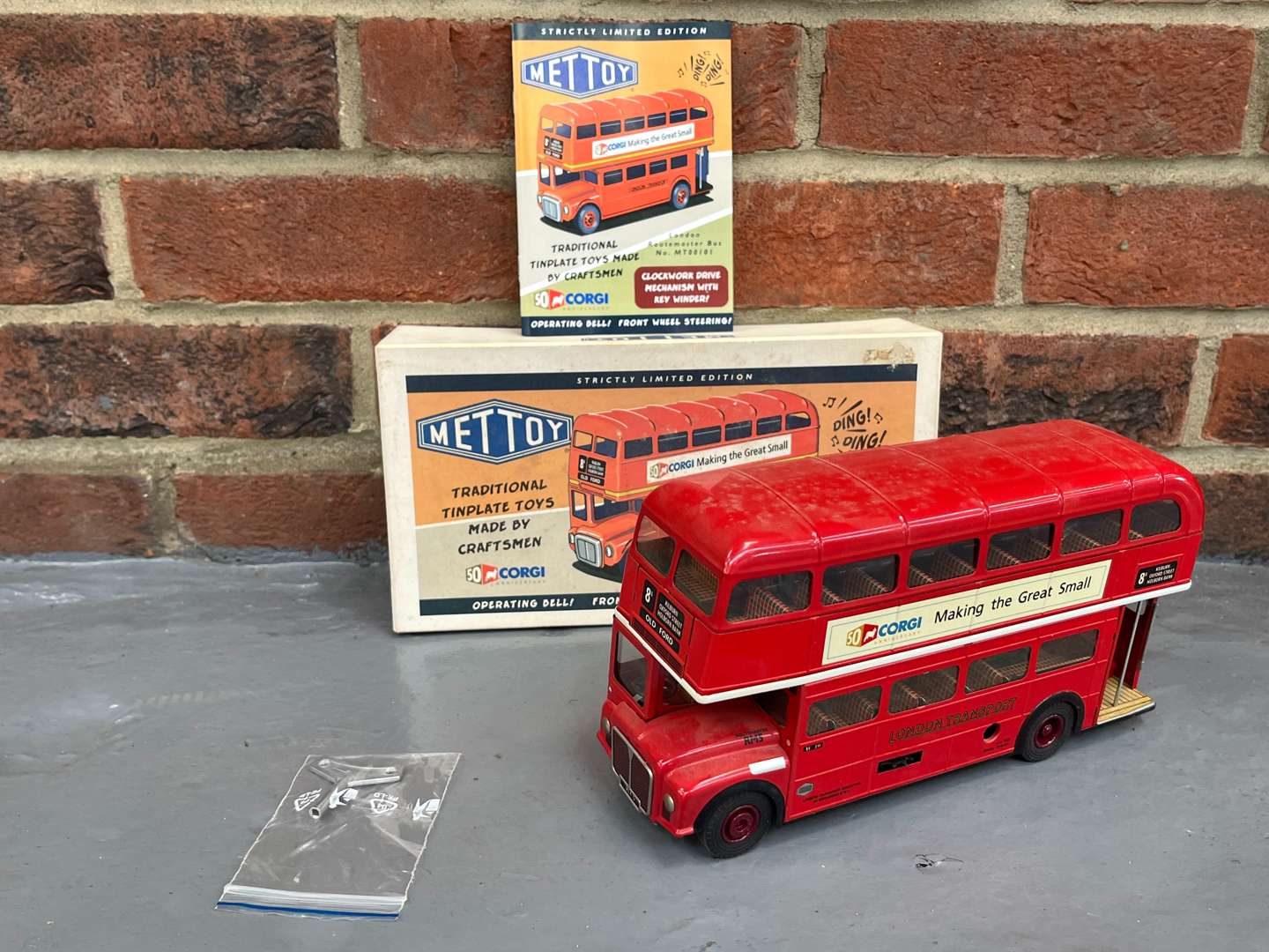 <p>Mettoy Corgi Anniversary Modern Tin Plate Double Decker Bus</p>
