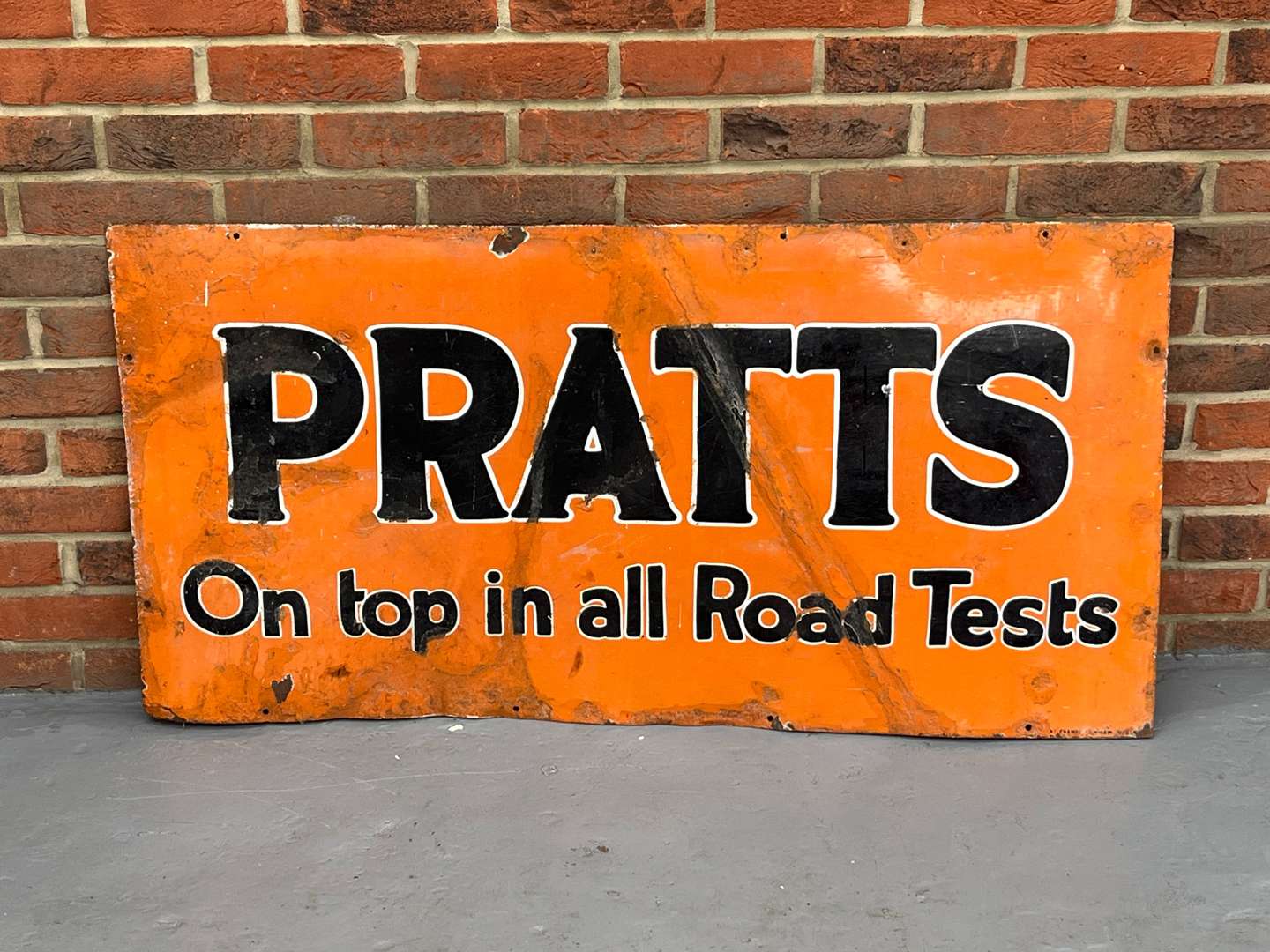 <p>Pratts “On Top In All Road Tests” Enamel Sign</p>