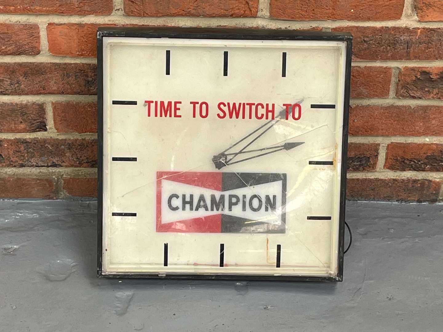 <p>Champion Spark Plug Electric Wall Clock a/f&nbsp;</p>