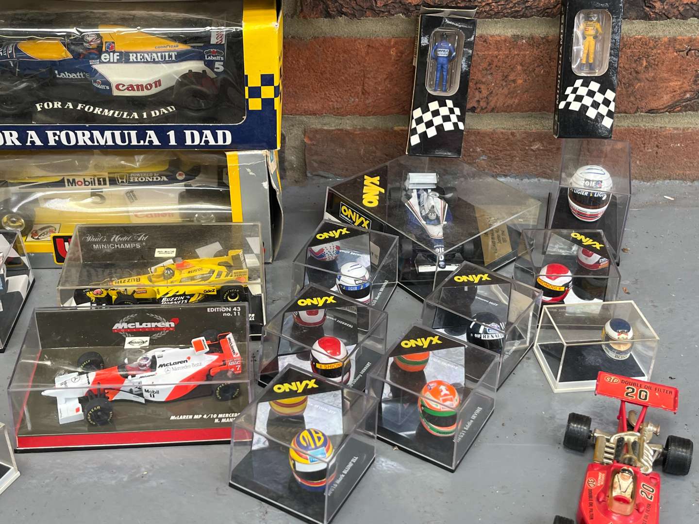 <p>Quantity of Formula 1 Model Cars and Helmets&nbsp;</p>
