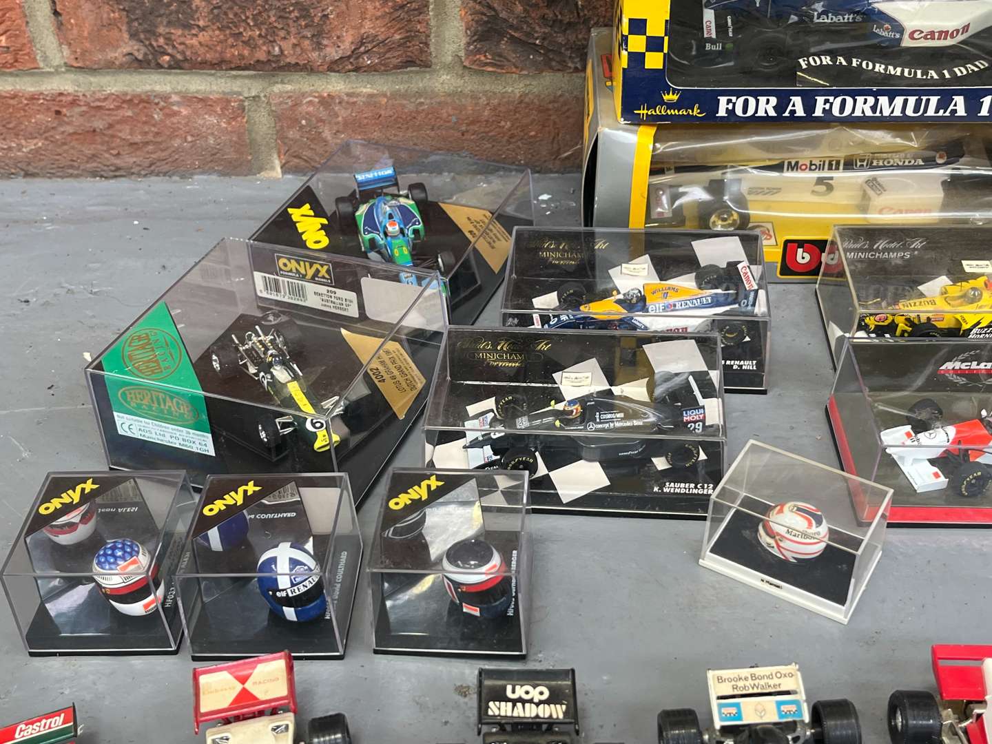 <p>Quantity of Formula 1 Model Cars and Helmets&nbsp;</p>