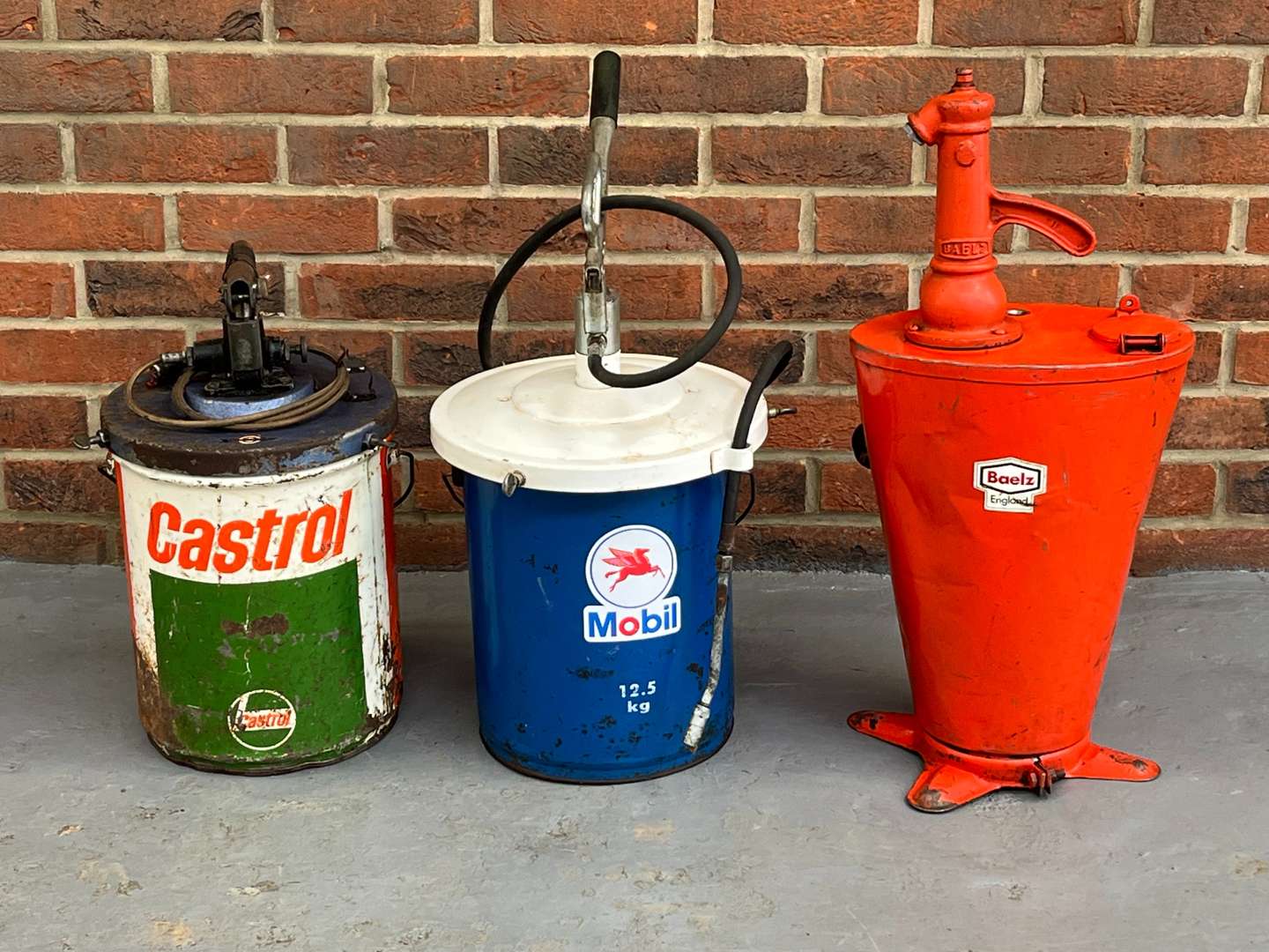 <p>Two Grease Dispensers and Oil Dispenser (3)</p>