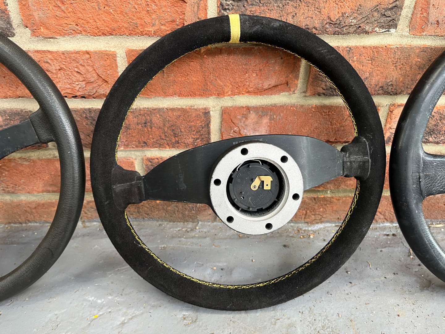 <p>Three Classic Car Steering Wheels, To Include Ford RS Etc</p>