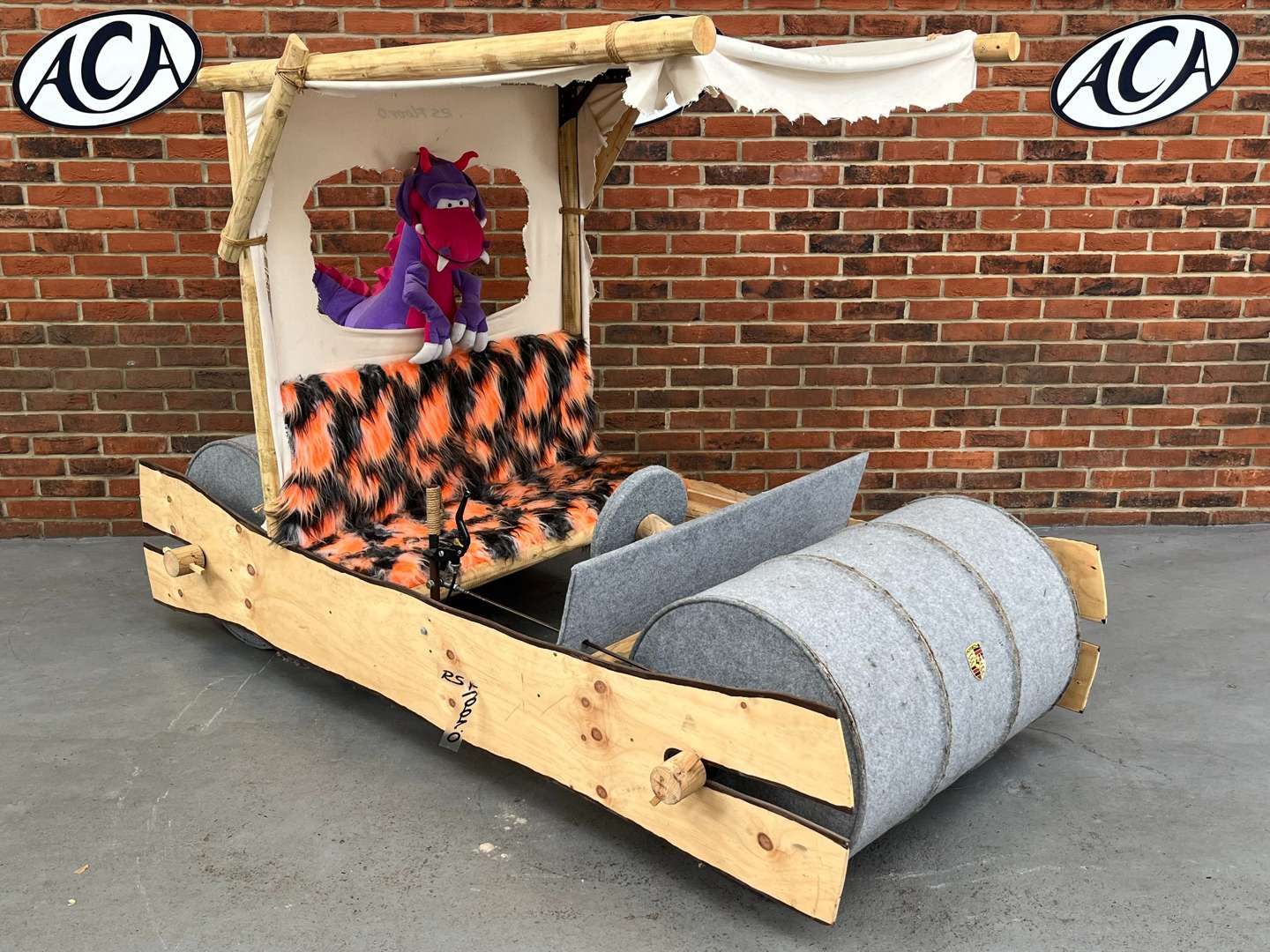 <p>Flintstones Car “All Proceeds To Charity”</p>