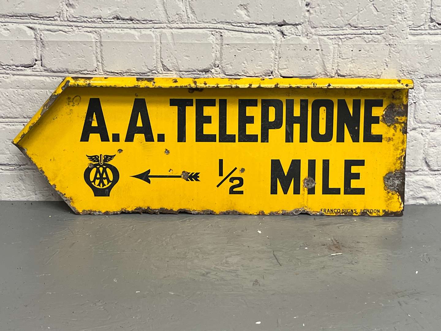 <p>AA Telephone ½ Mile Directional Sign</p>