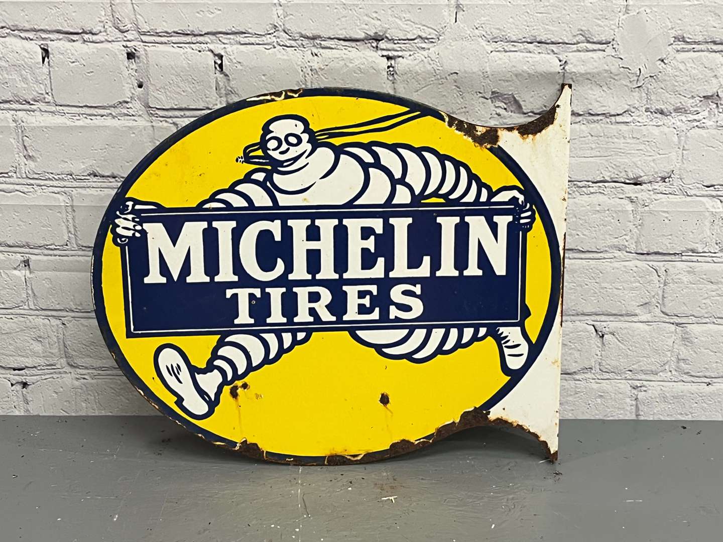 <p>Michelin Tires Enamel Flange Sign</p>