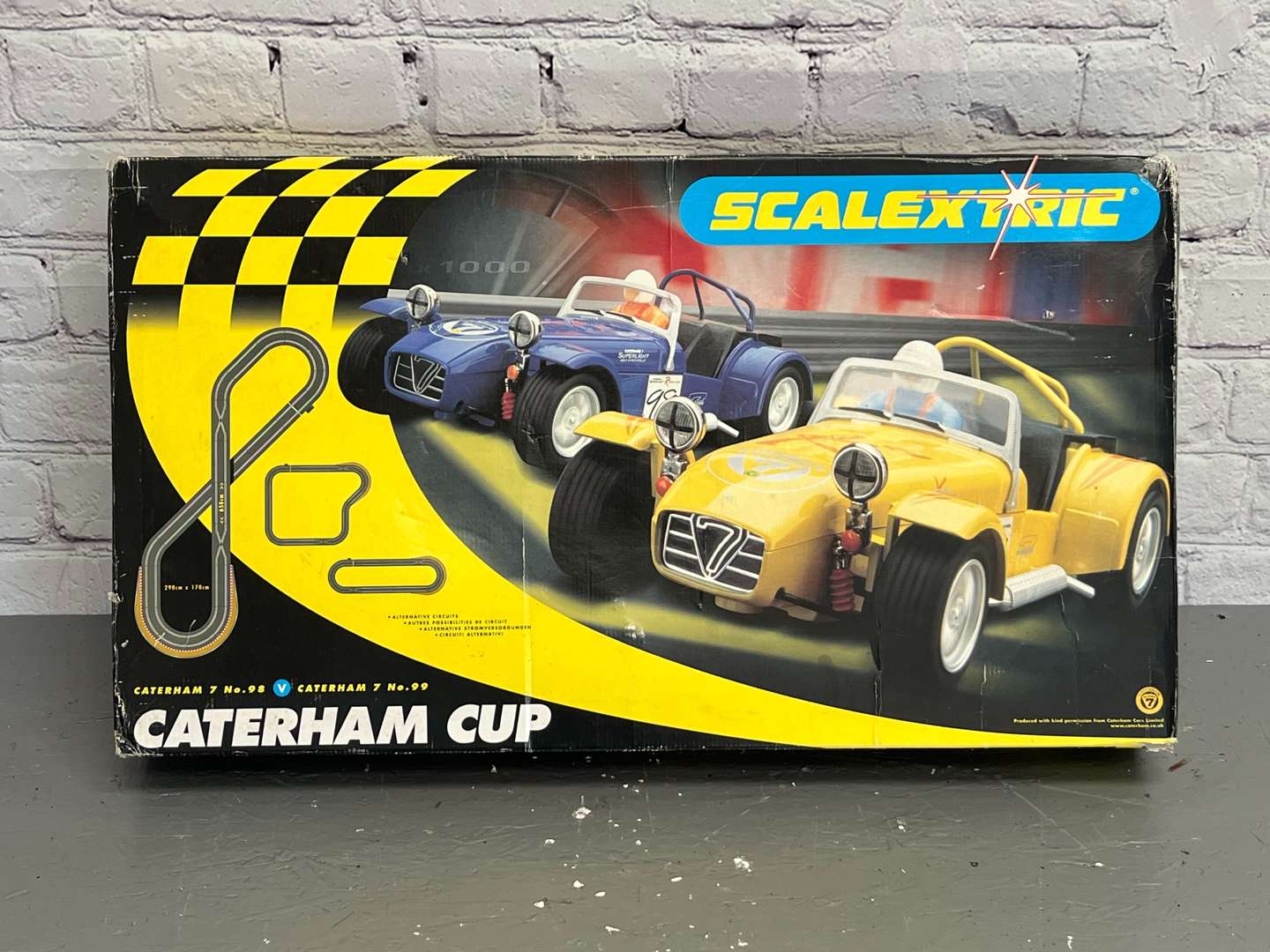 <p>Scalextric Boxed Caterham Cup Set&nbsp;</p>