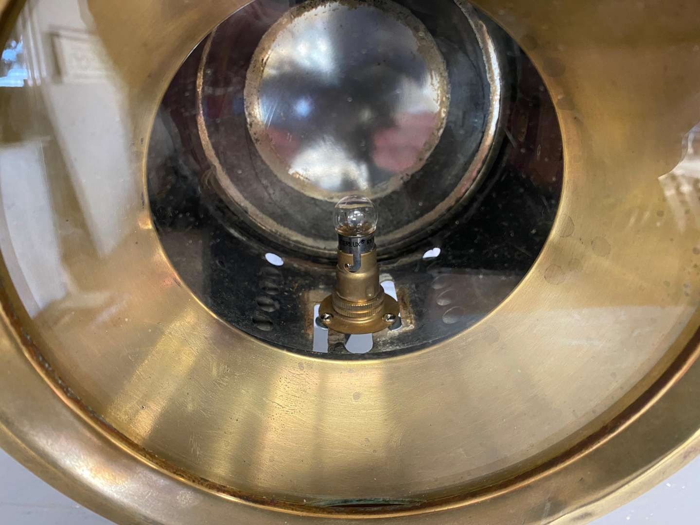 <p>An Early 20th century brass cased vehicle headlamp,</p>