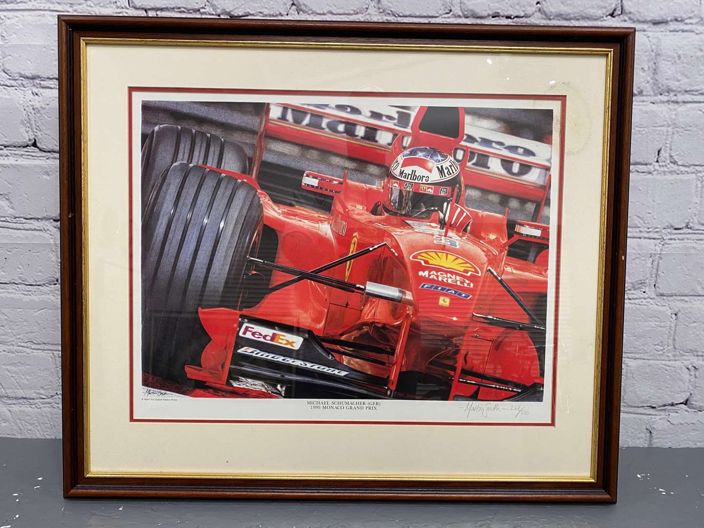 <p>A mixed lot of framed motor racing pictures,</p>