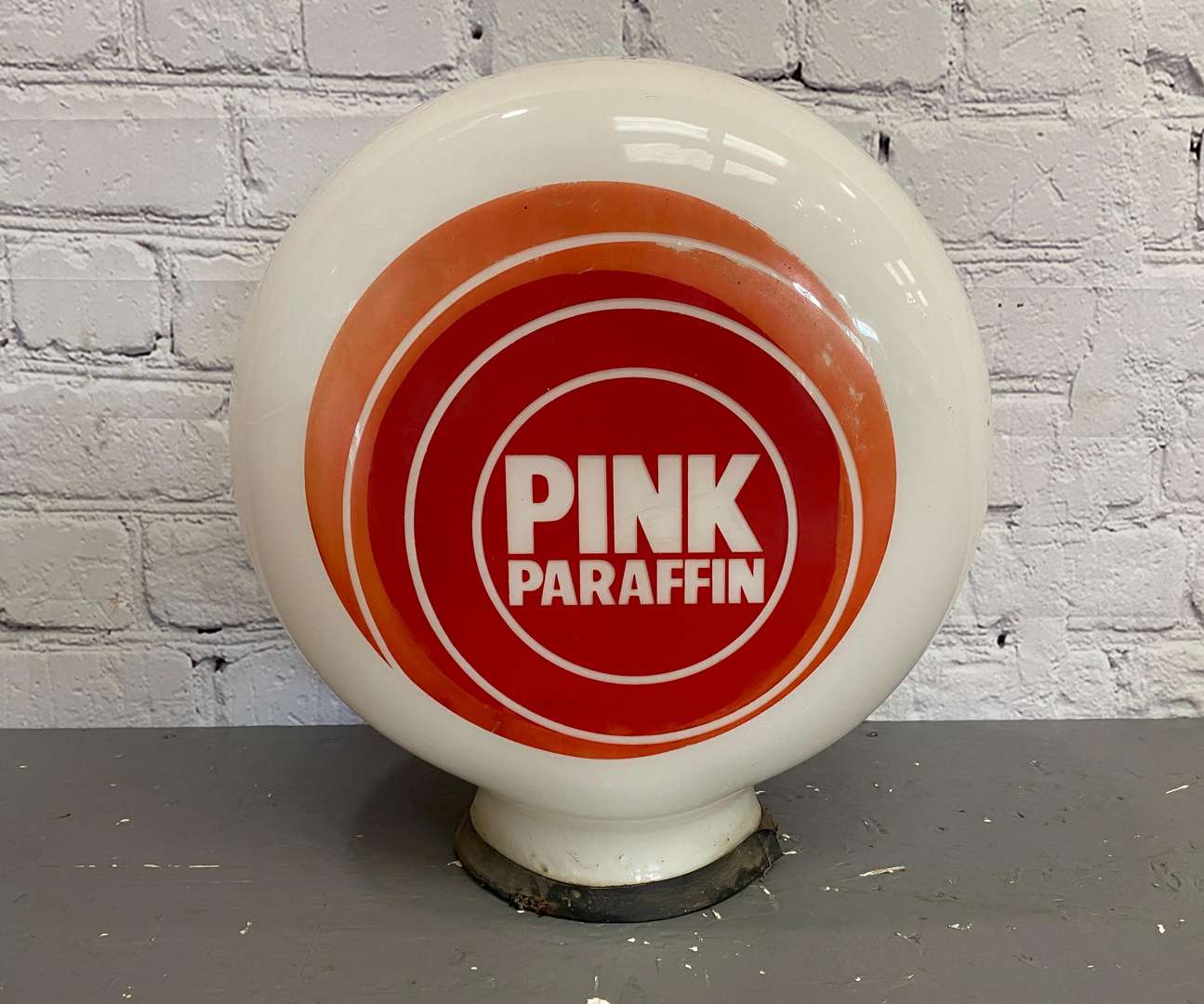 <p>Pink Paraffin, a mid 20th century opaque glass globe,</p>