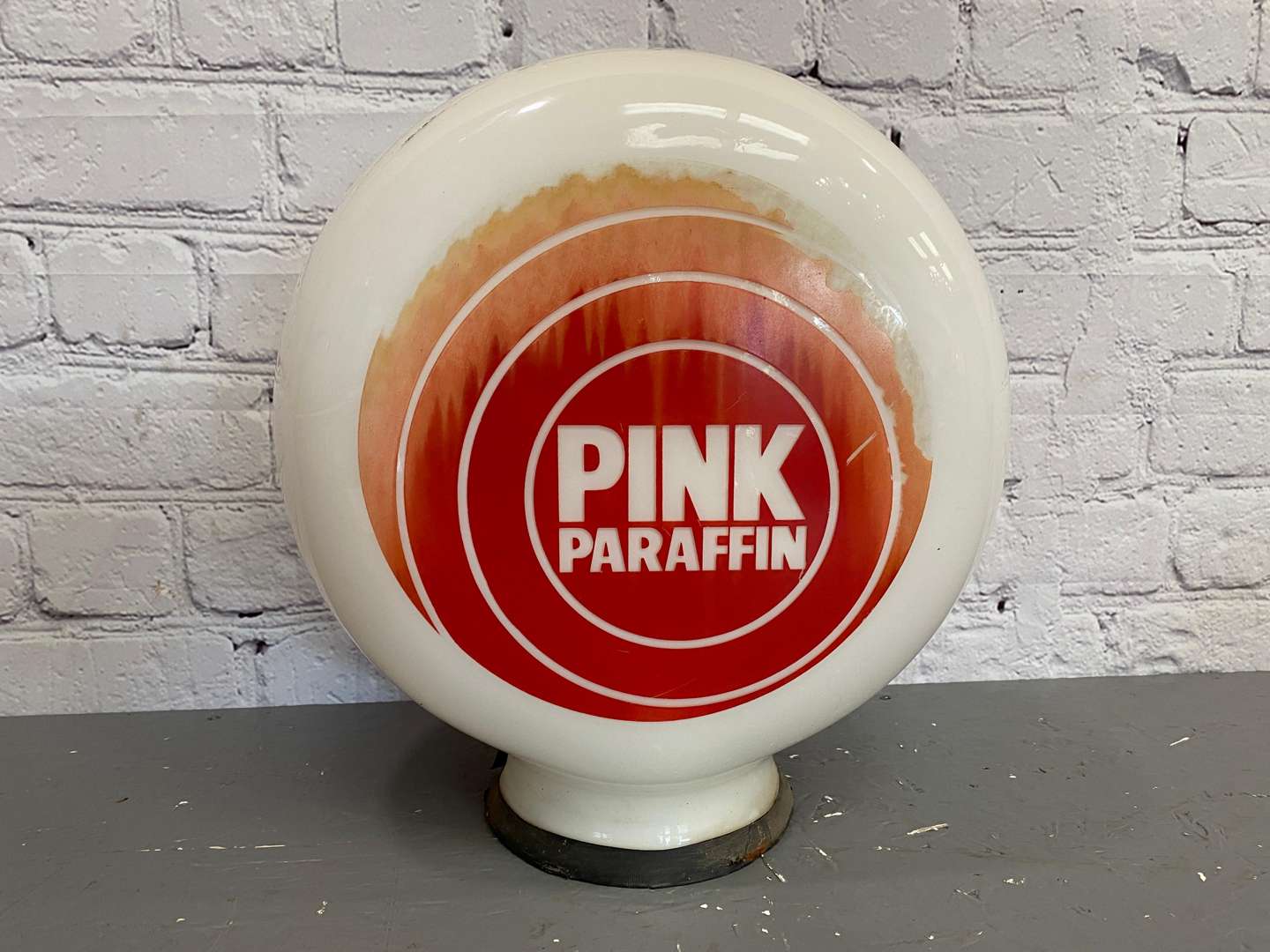 <p>Pink Paraffin, a mid 20th century opaque glass globe,</p>