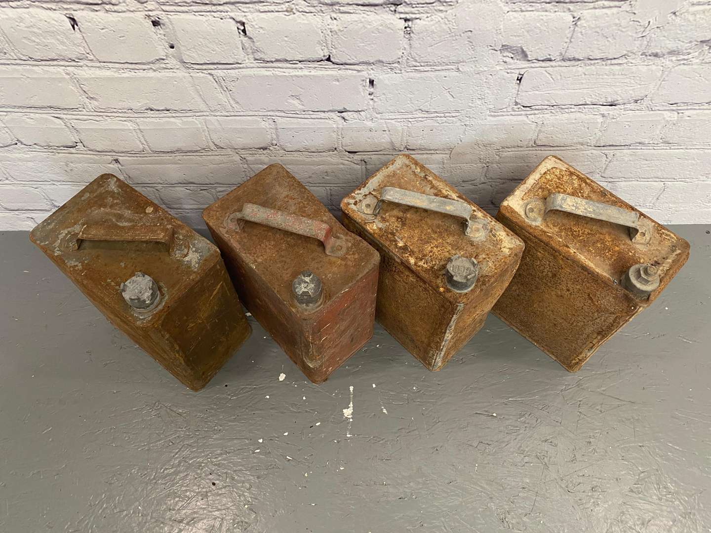 <p>Four x 2-Gallon Petrol / Oil cans,</p>