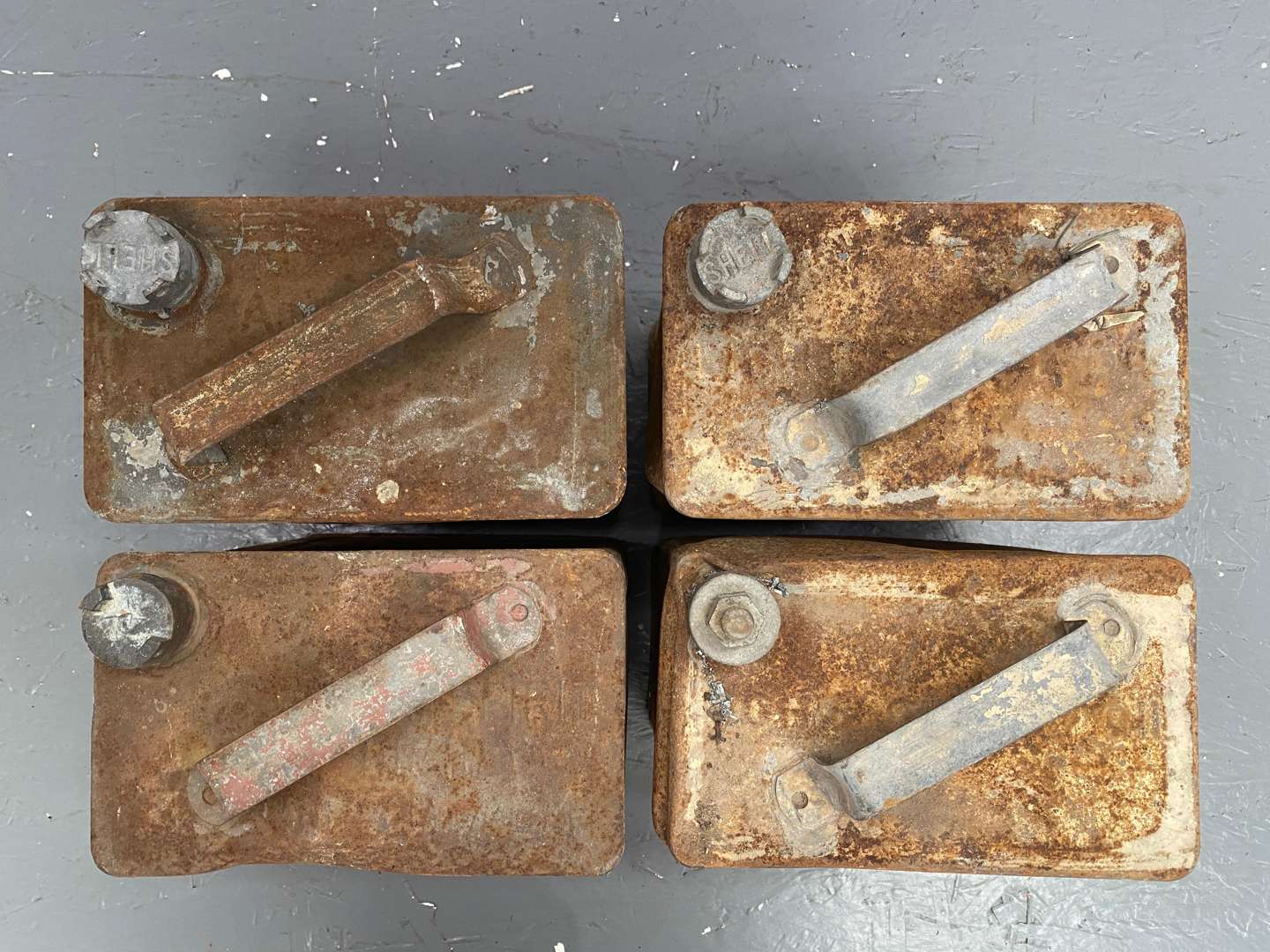 <p>Four x 2-Gallon Petrol / Oil cans,</p>