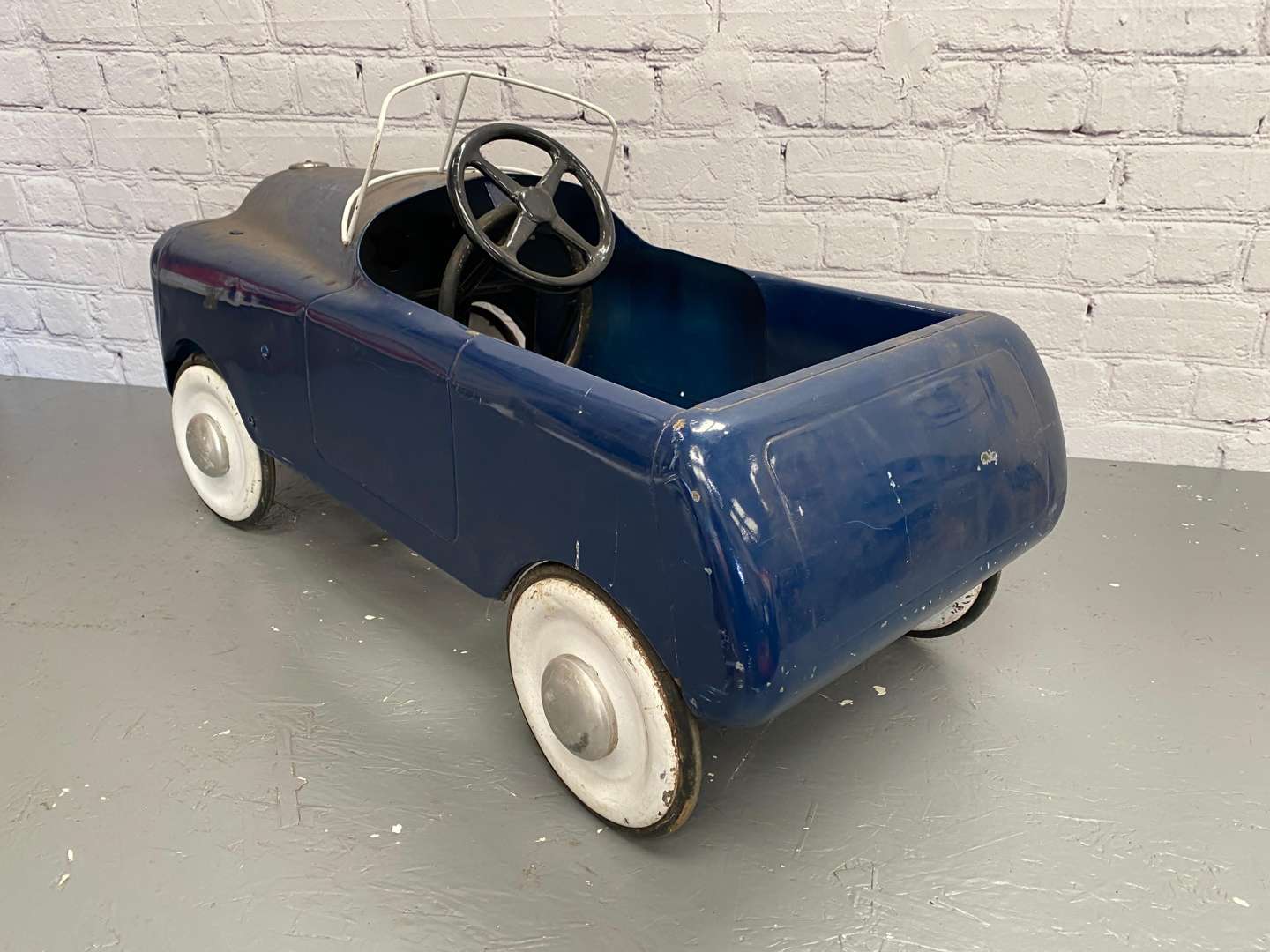 <p>Tri-ang, pressed steel pedal car,</p>
