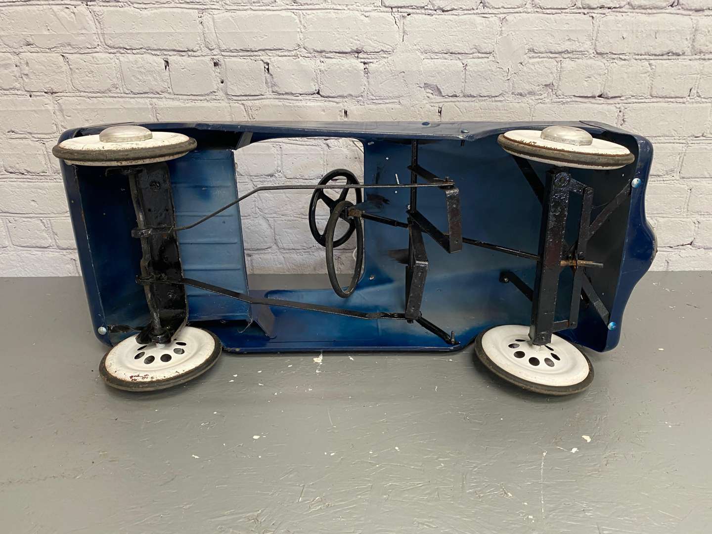 <p>Tri-ang, pressed steel pedal car,</p>