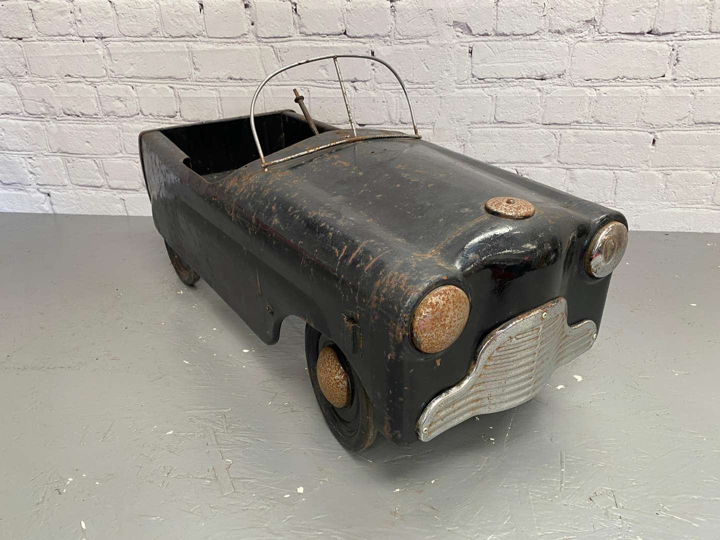 <p>Tri-ang, "Squad Car”, a pressed steel pedal car,</p>