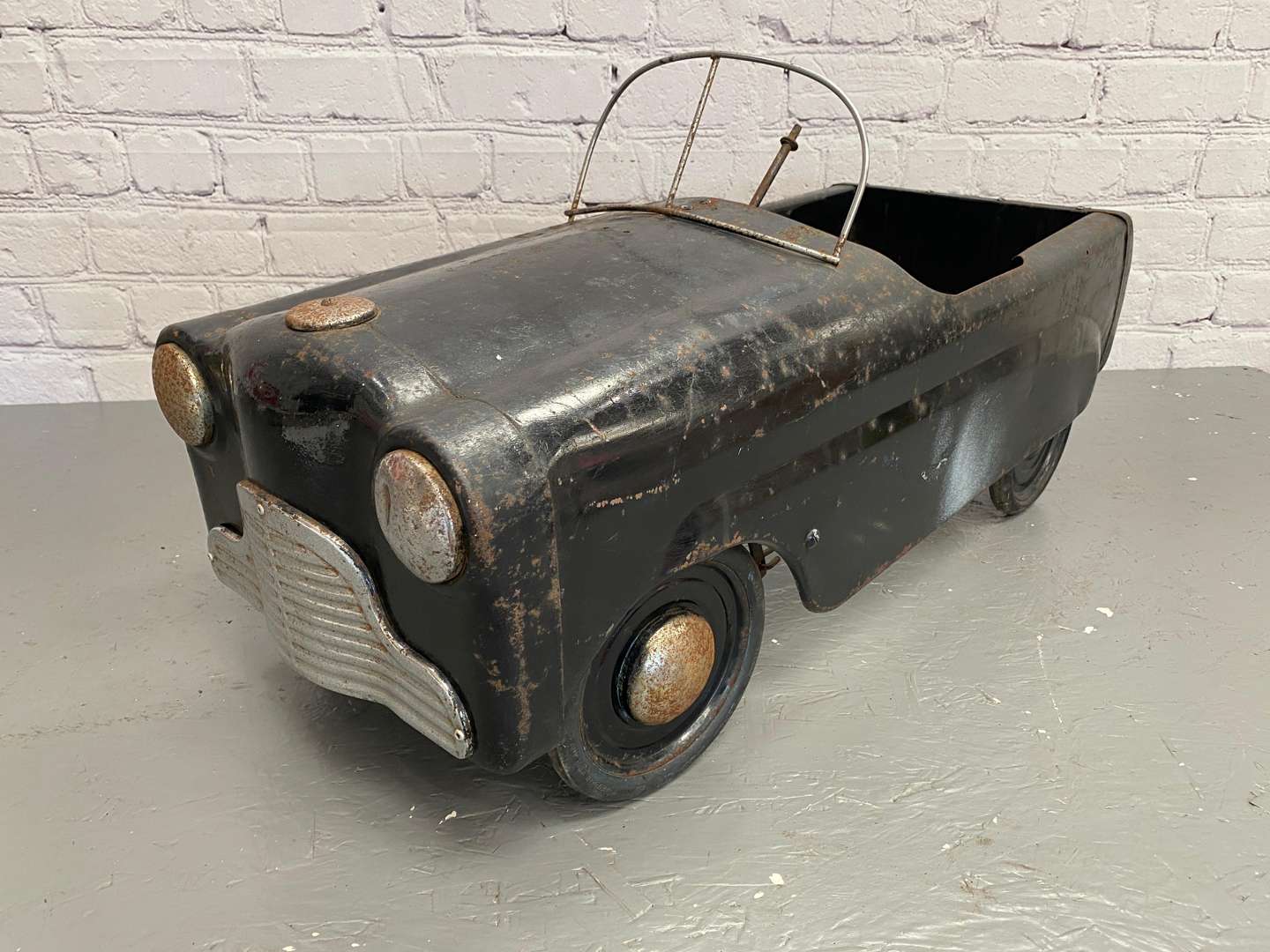 <p>Tri-ang, "Squad Car”, a pressed steel pedal car,</p>