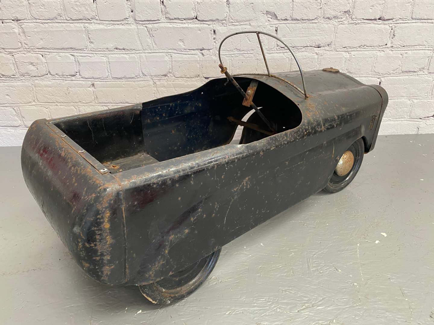 <p>Tri-ang, "Squad Car”, a pressed steel pedal car,</p>