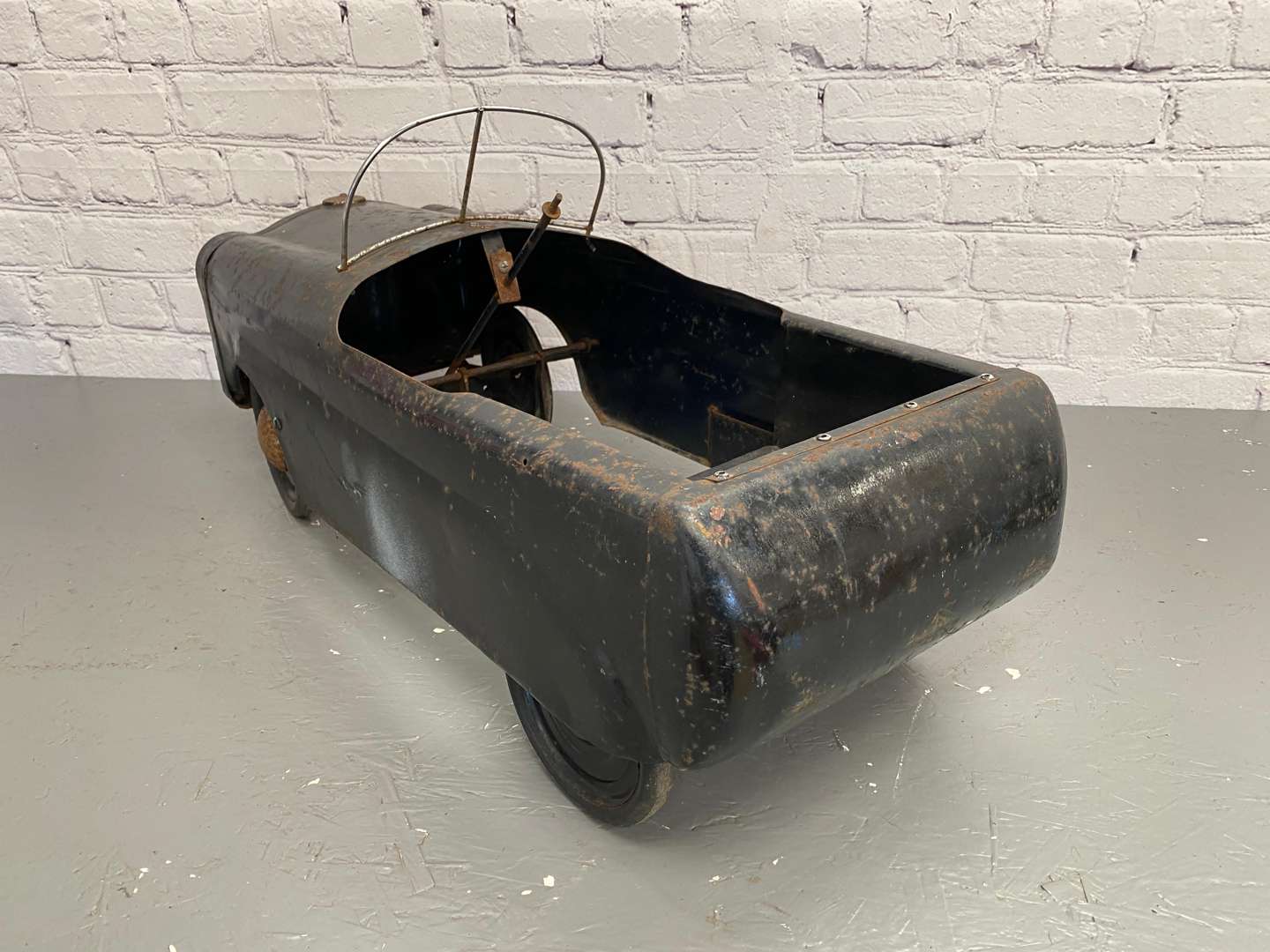 <p>Tri-ang, "Squad Car”, a pressed steel pedal car,</p>