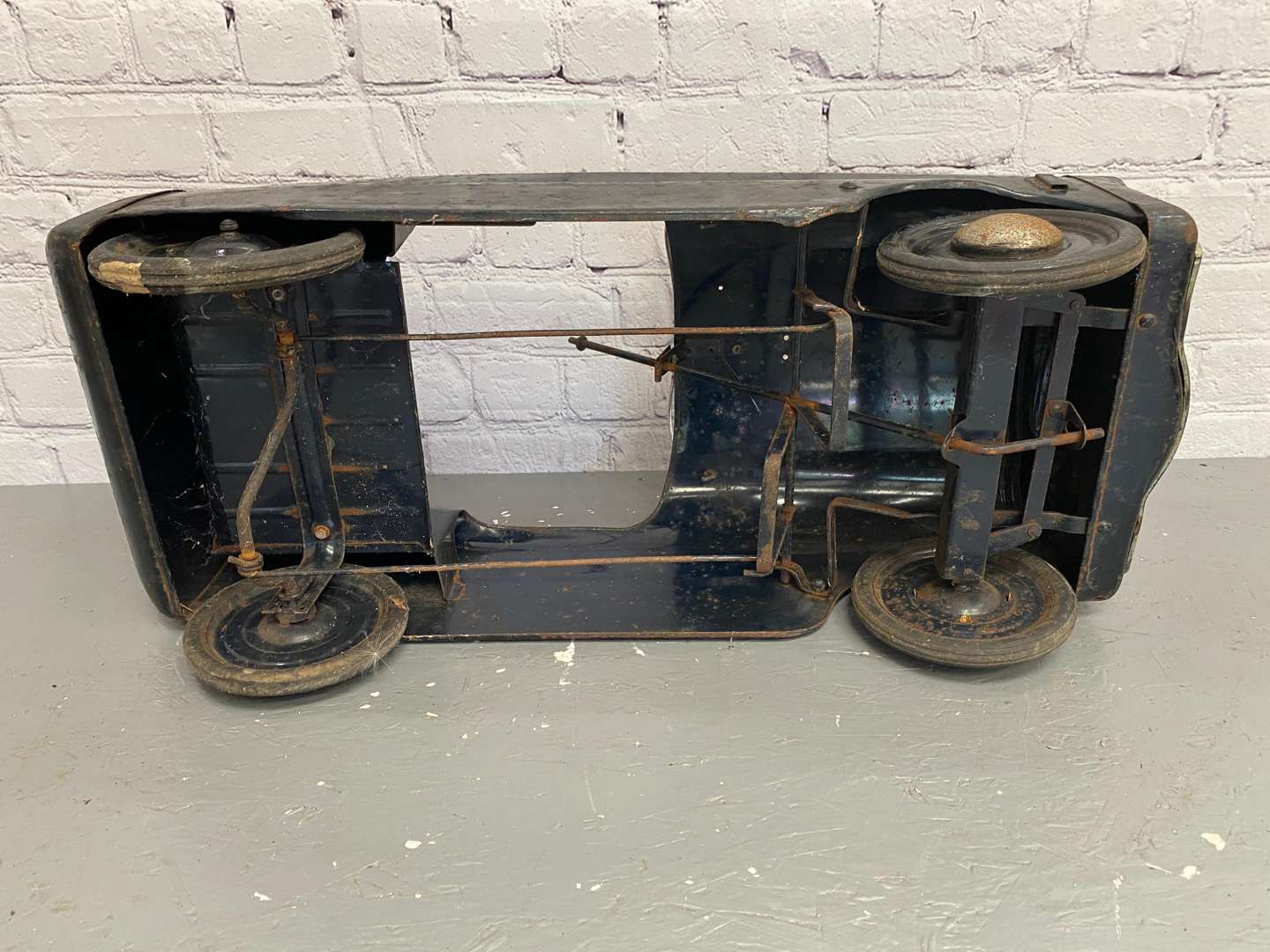 <p>Tri-ang, "Squad Car”, a pressed steel pedal car,</p>