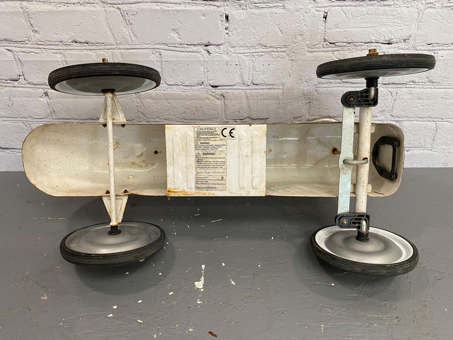 <p>Kalee for Halfords, a modern pressed and cut steel, push along car,</p>