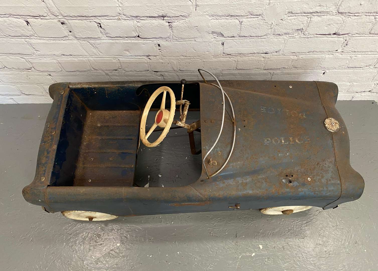 <p>Tri-ang, mid 20th century pressed steel “Police” pedal car, LBL4242,</p>