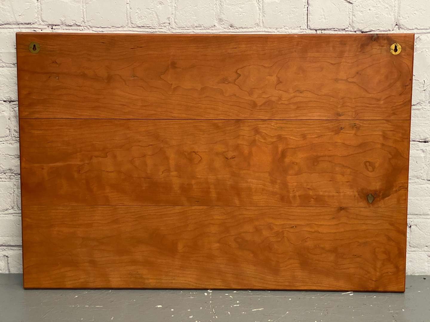 <p>Sheffield Garner Ltd- Diss, a modern carved wooden and brass inlaid presentation plaque,</p>