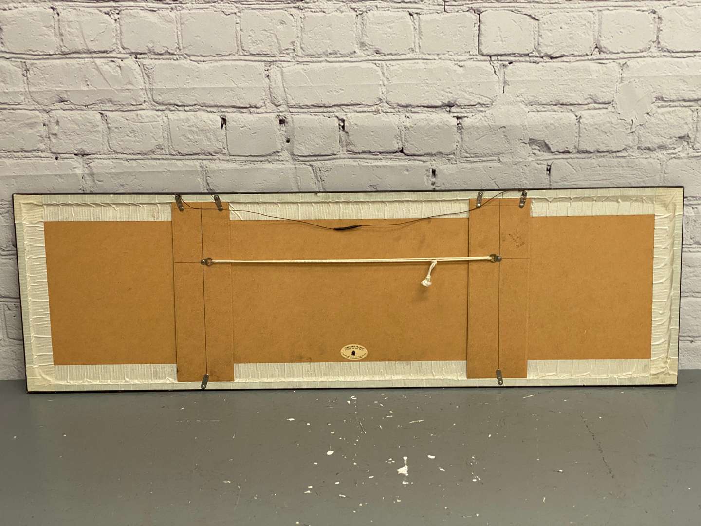 <p>Mereside Ford, a modern framed card dealership sign,</p>