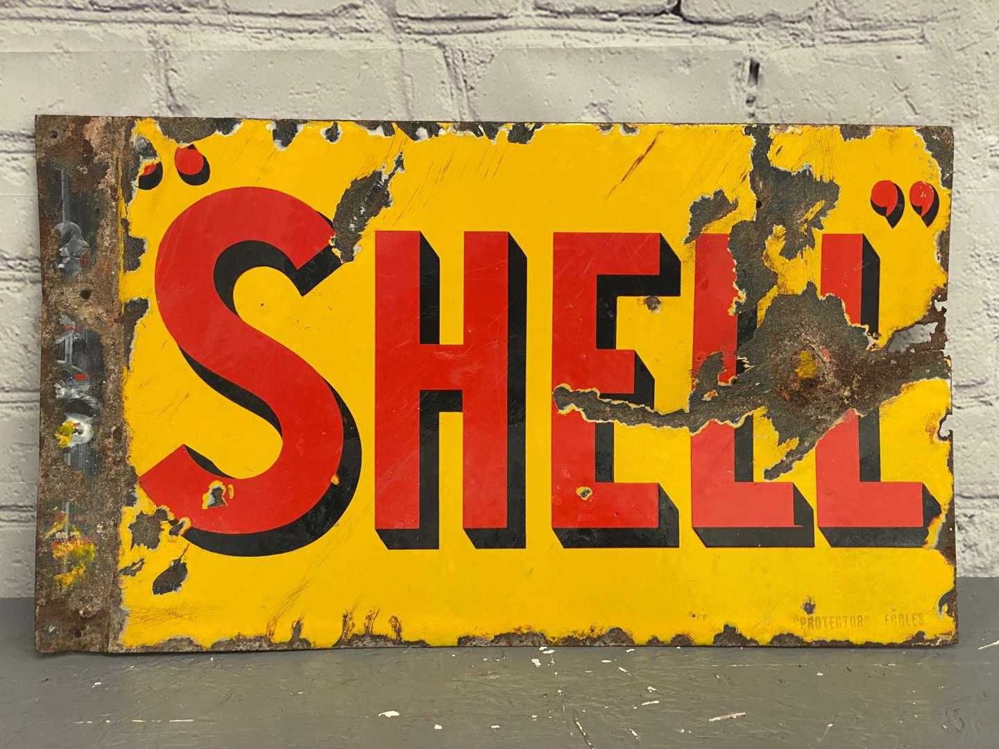 <p>Shell, an early 20th century, double sided, steel and enamel flange sign,</p>