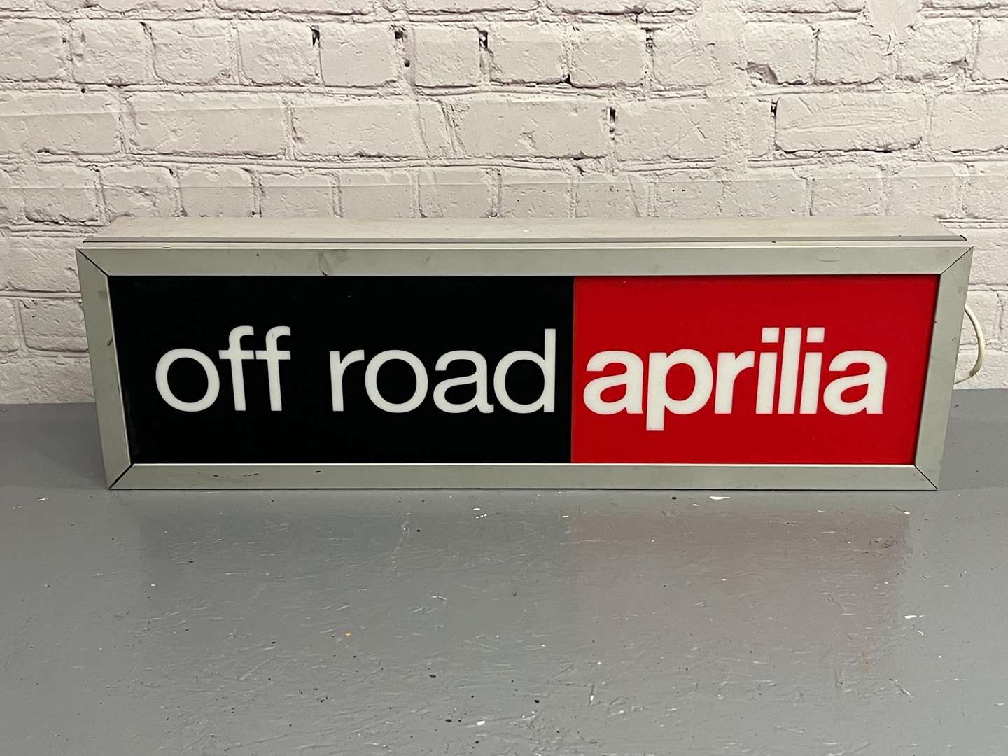 <p>Aprilla Off Road Original Illuminated Dealership Sign</p>