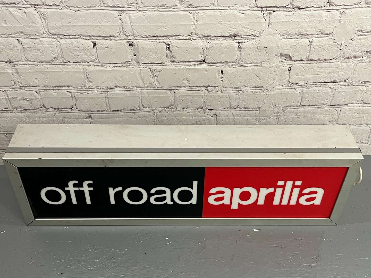 <p>Aprilla Off Road Original Illuminated Dealership Sign</p>