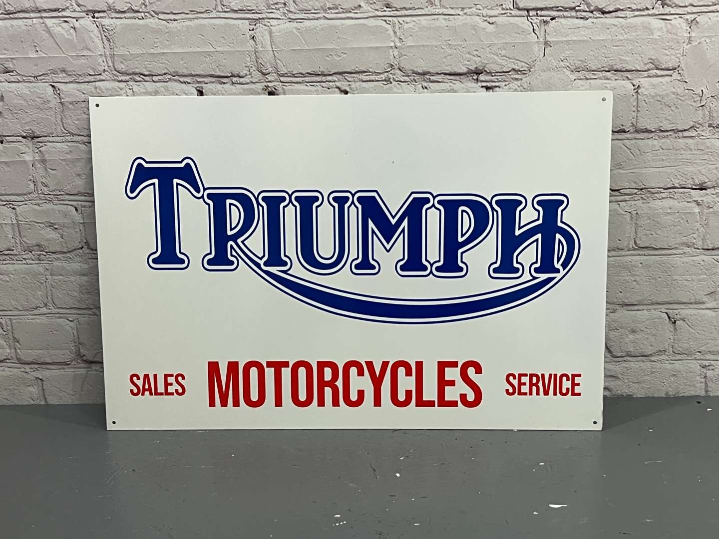 <p>Triumph Sales and Motorcycles Metal Sign</p>